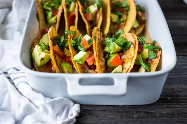 Healthy Baked Vegetarian Tacos - Kid friendly and just 15 minutes of prep before going into the oven to bake. | www.feastingathome.com