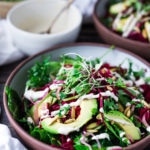 VEGAN POWER SALAD- This Beet and Avocado Salad with Cashew Tahini Dressing, power greens, cashew basil pesto, quick pickled shallots and toasted pumpkin seeds is the BEST! | www.feasingathome.com