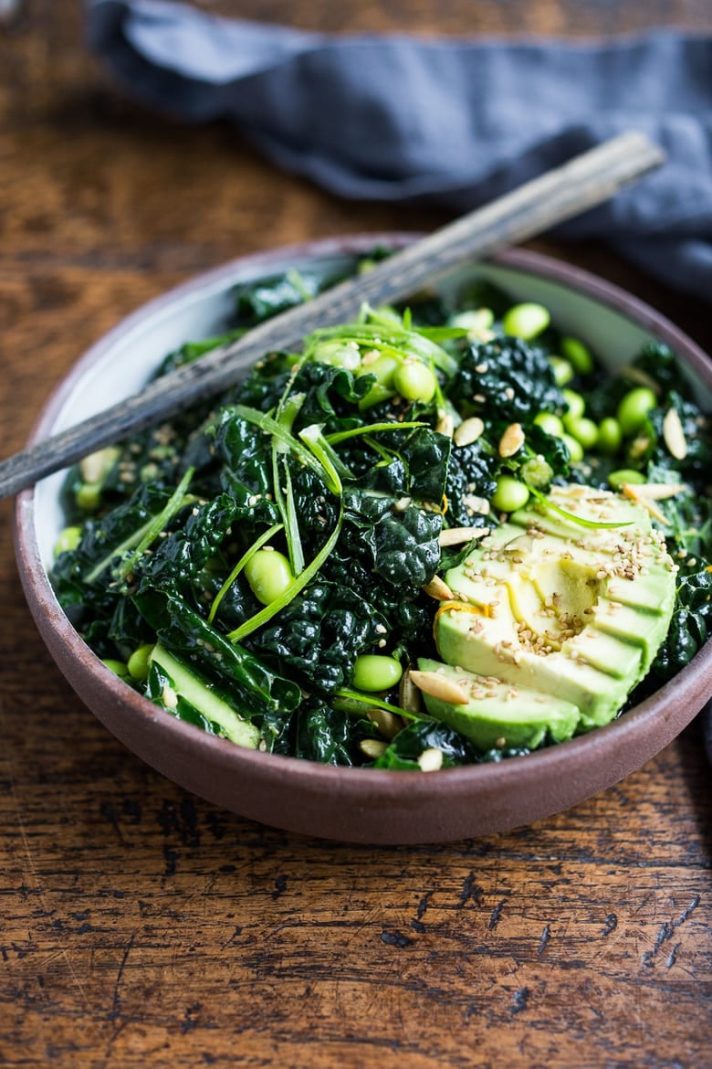 Emerald Kale Salad w/ Sesame Ginger Dressing, Avocado, edamame, scallions, pumpkin seeds and orange zest. Add seared tofu and turn it into dinner! | www.feastingathome.com #vegan #kale #salad #glutenfree