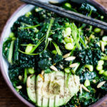 Emerald Kale Salad w/ Sesame Ginger Dressing, Avocado, edamame, scallions, pumpkin seeds and orange zest. Add seared tofu and turn it into dinner! | www.feastingathome.com #vegan #kale #salad #glutenfree