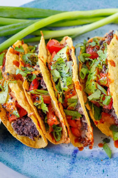 Easy Baked Vegetarian Tacos that can be made in under 30 minutes with simple ingredients. Keep them vegetarian or add chicken or ground meat!
