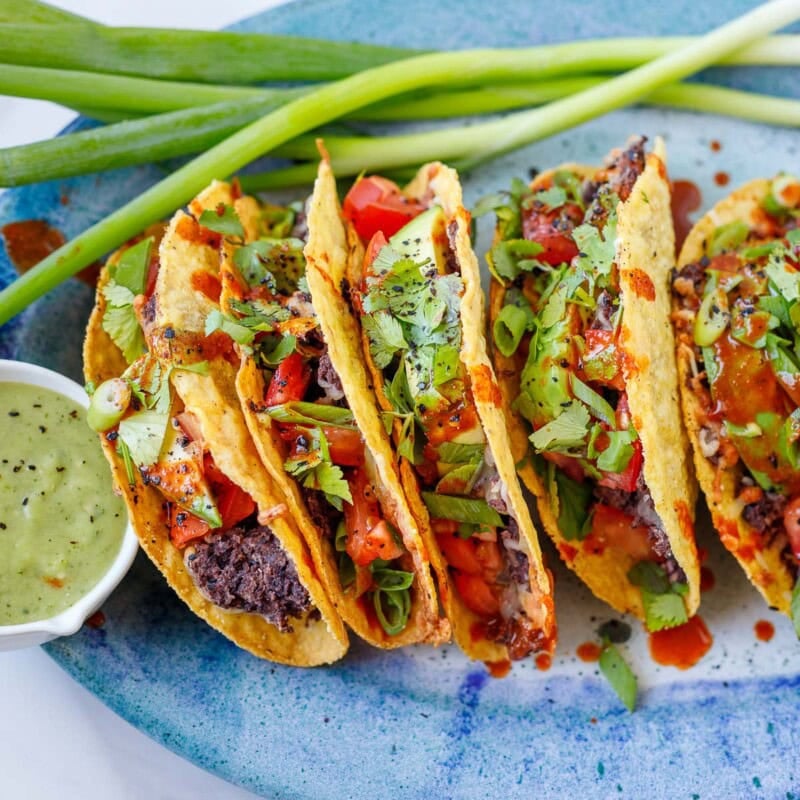 Easy Baked Vegetarian Tacos that can be made in under 30 minutes with simple ingredients. Keep them vegetarian or add chicken or ground meat!