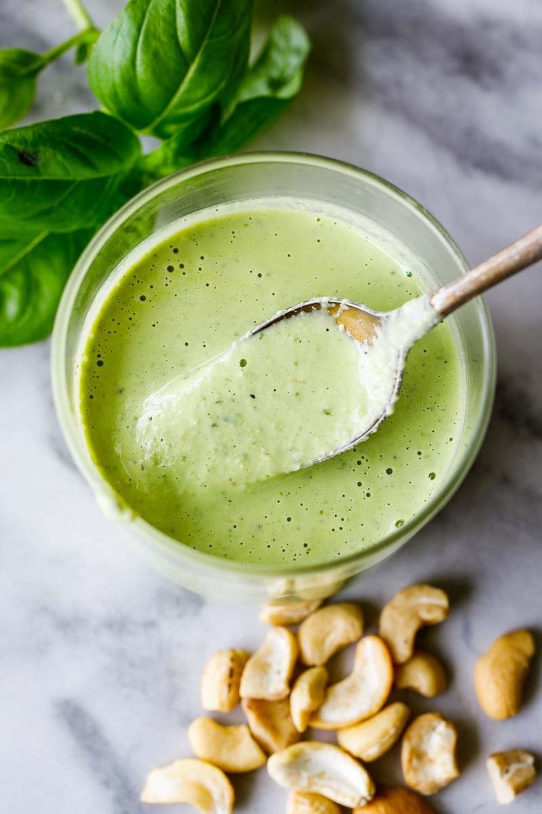 Creamy Cashew Basil Dressing - tangy, creamy, vegan and full of summer flavor. Use on crispy-crunchy lettuces like romaine and little gems and perfect with summer tomatoes.