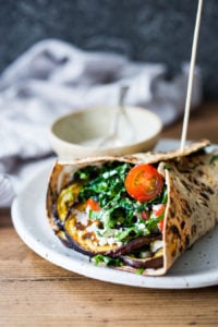 10 Plant Based Clean Eating Recipes like this Grilled Eggplant Wrap with Kale Parsley Slaw and Tahini Sauce | www.feastingathome.com