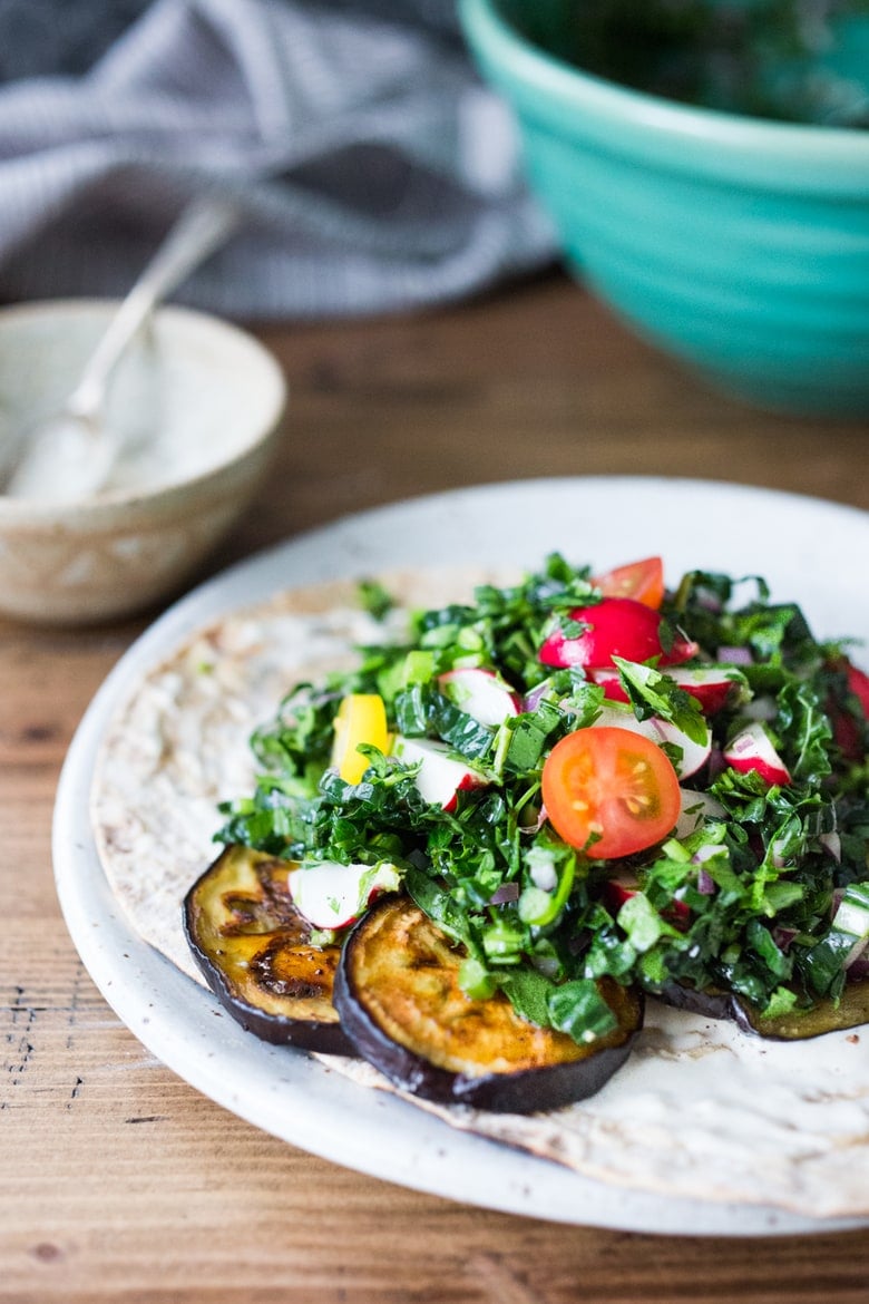 Middle Eastern Eggplant Wrap with a lemony Kale Parsley Mint Slaw with Creamy Tahini Sauce. Keep it vegan or add feta! | www.feastingathome.com