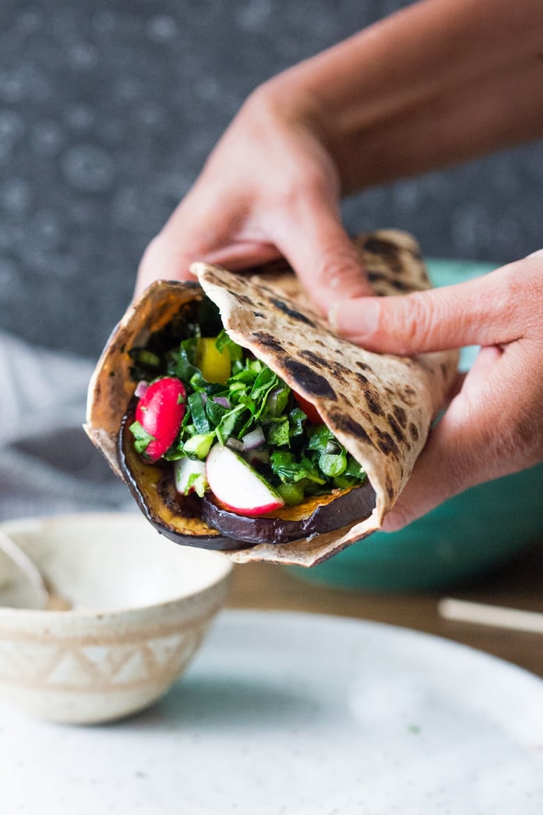 20 HEALTHY LUNCH RECIPES! Middle Eastern Eggplant Wrap with a lemony Kale Parsley Mint Slaw with Creamy Tahini Sauce. Keep it vegan or add feta! | www.feastingathome.com #veganwrap #healthylunches #eggplantwrap 