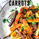 Sweet and Spicy Roasted Moroccan Carrots- with cumin, cinnamon and orange. A Delicious vegan side dish or serve over seasoned lentils for a hearty vegetarian meal. | www.feastingathome.com #carrots #roastedcarrots #moroccancarrots #vegan #vegansalad #cleaneating