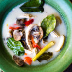 Authentic Tom Kha Gai Soup (Thai Coconut Chicken Soup) - a healthy, delicious and easy recipe that can be made in an Instant Pot or on the stove top. Vegan Adaptable! #tomkha #thaisoup #tomkhagai #paleo #keto #thaichickensoup #galangal #coconutsoup #traditional