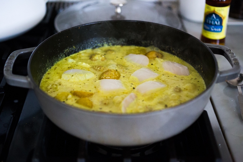 Balinese Fish Curry with potatoes, spring veggies, lime and mint in a fragrant curry sauce.| www.feastingathome.com 