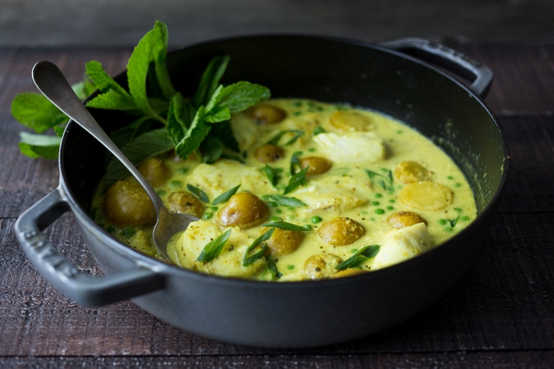 Balinese Fish Curry with potatoes, spring veggies, lime and mint in a fragrant curry sauce.| www.feastingathome.com 