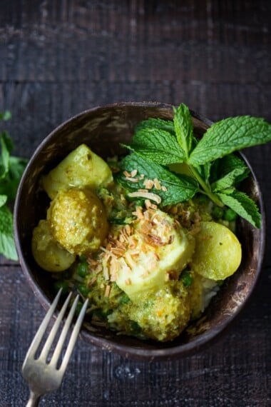 Balinese Fish Curry with potatoes and spring peas. | www.feastingathome.com