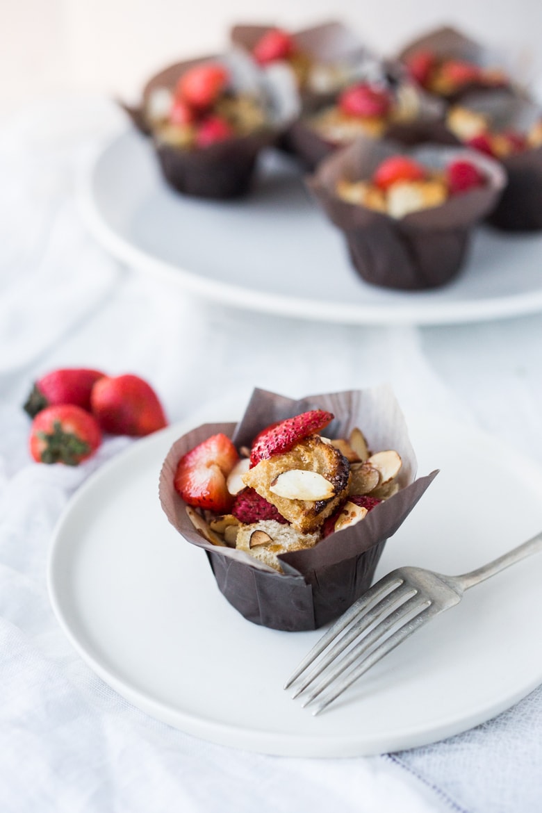 French Toast Muffins with Strawberries and Almonds- a perfect beginning to Easter Brunch or Mother's Day Brunch. Simple and easy to make! | www.feastingathome.com