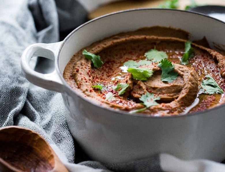 How to make Homemade Refried Beans from scratch- a simple delicious recipe that is vegan and gluten-free! | www.feastingathome.com