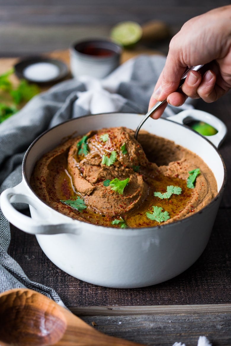A delicious Refried Beans recipe that can be made on Stove top or in an Instant Pot! A delicious healthy recipe that is vegan and gluten-free! | www.feastingathome.com #refriedbeans #instantpot #vegan #refriedbeansrecipe