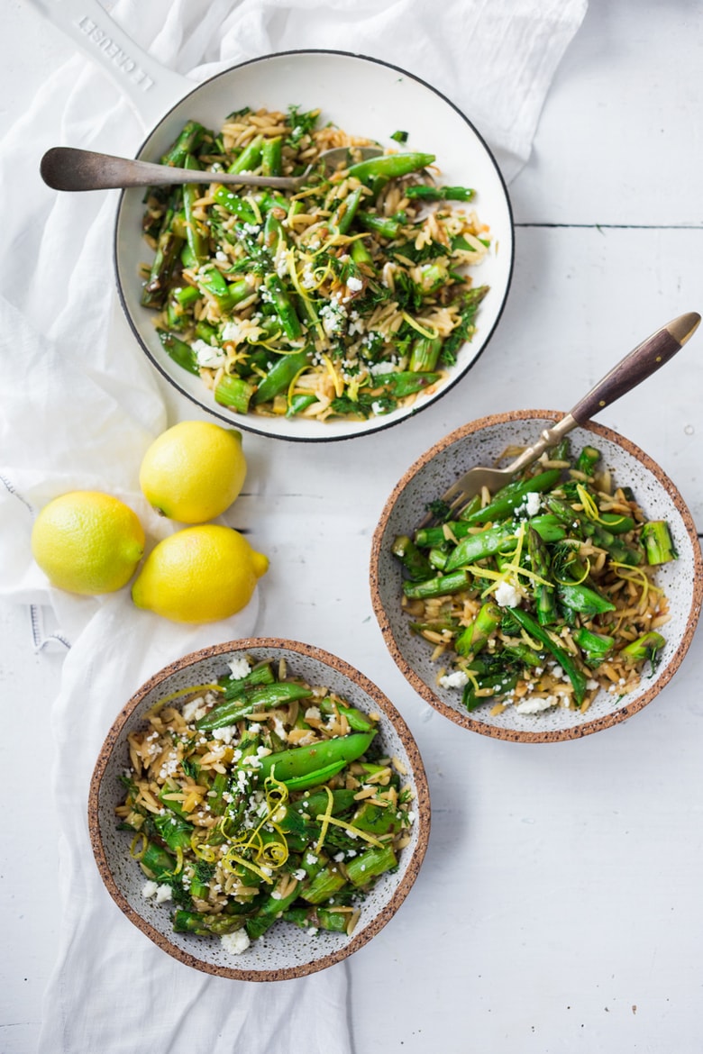 This recipe for Lemon Orzo with Asparagus- is perfect for spring! Quick and easy, serve this spring pasta "warm" as a dinner,  or chilled as a side salad. Vegan adapatable.