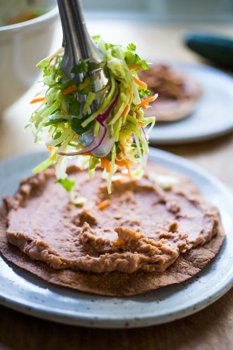 How to make Tlayudas de Oaxaca - Oaxacan Street food that is not only delicious, its good for you! Vegan and GF adaptable! | www.feastingathome.com