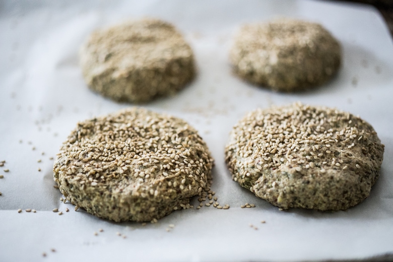 Sprouted Lentil Burgers- grillable, vegan and gluten-free adaptable. Super healthy and delicious, packed with living nutrients! Topped with quick picked beets. | www.feastingathome.com