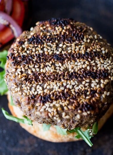 Sprouted Lentil Burgars- grillable, vegan and gluten free adaptable. Topped with picked beets. | www.feastingathome.com