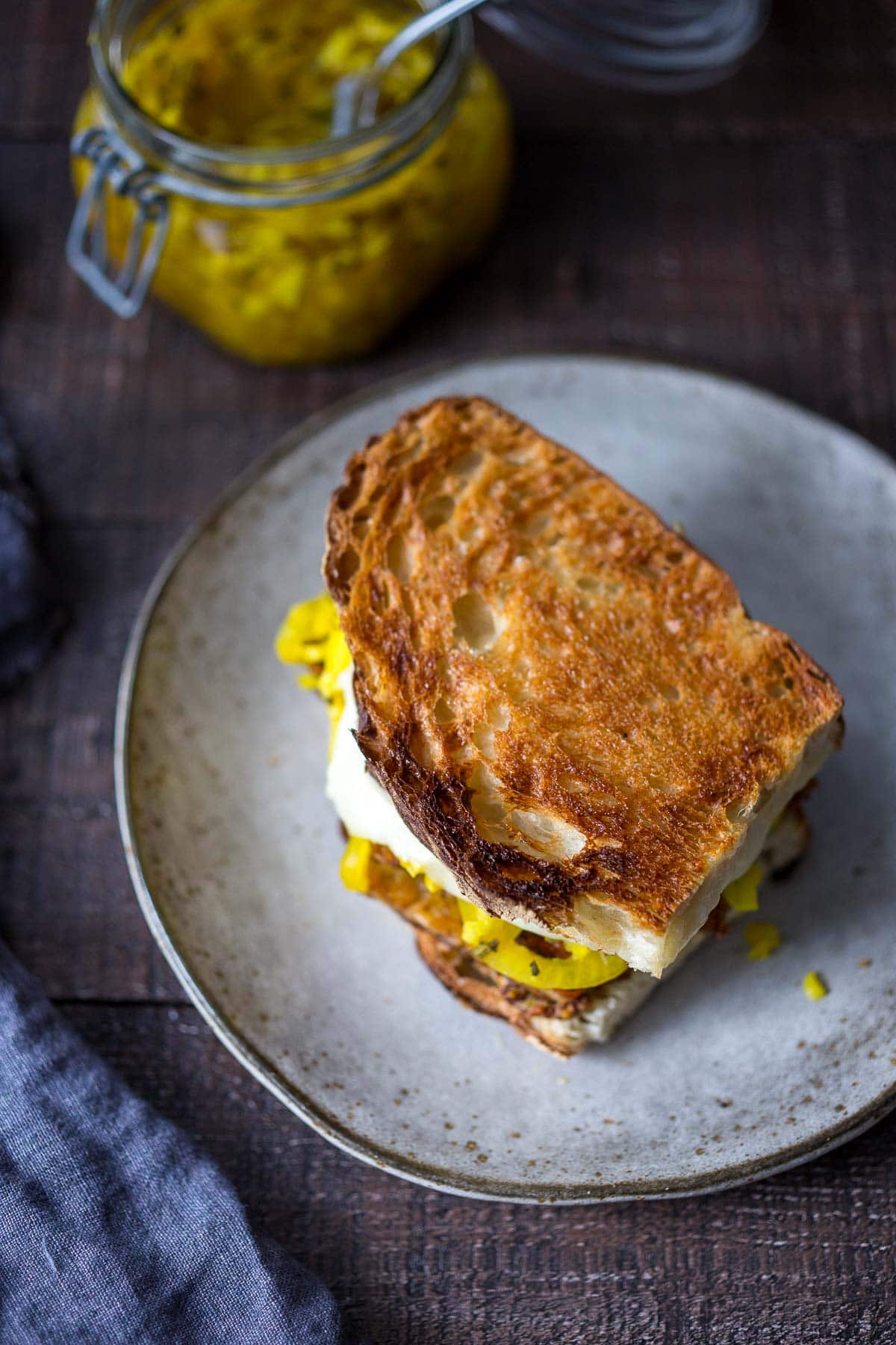 This toasty Tempeh Reuben Sandwich is so delicious! Made with melty cheese, flavorful seared tempeh, and Sauerkraut, keep it vegetarian or use vegan cheese for a vegan reuben! 