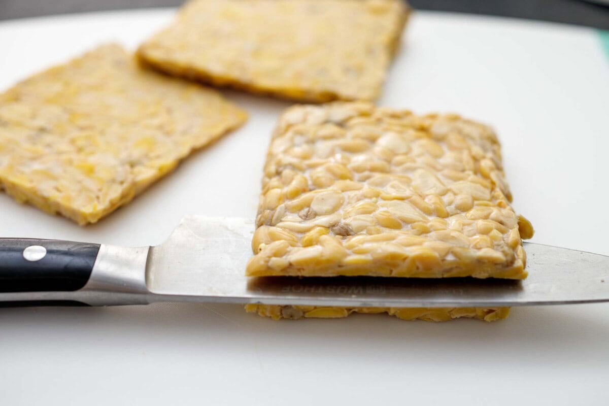 cutting the tempeh. 