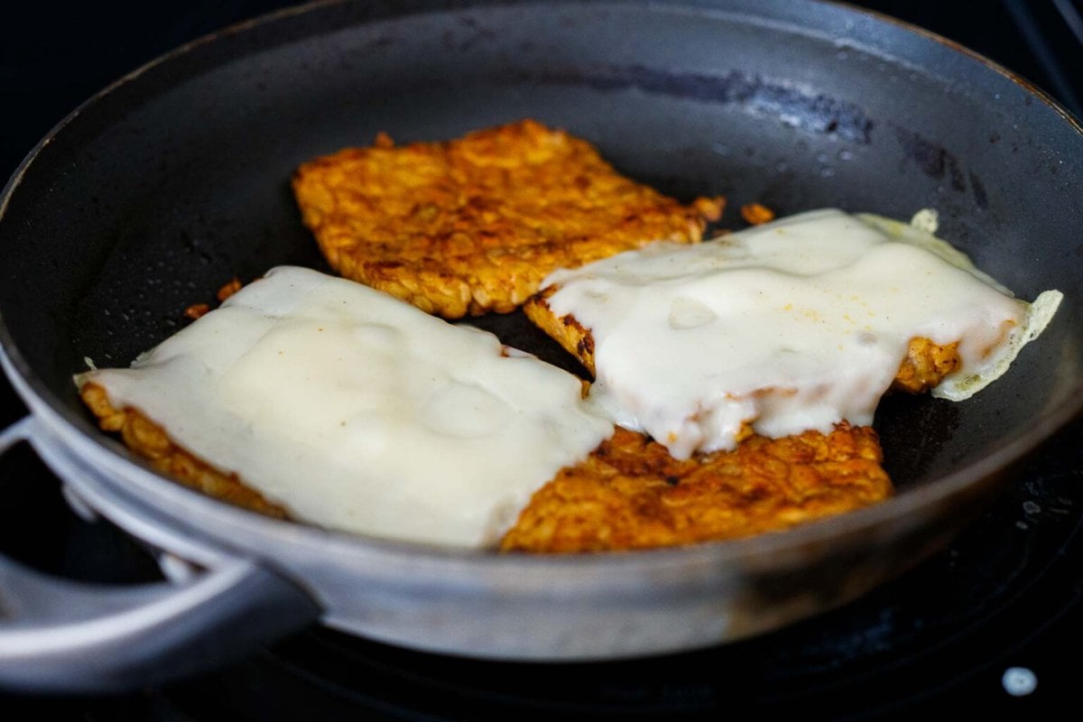 melting cheese on the tempeh.