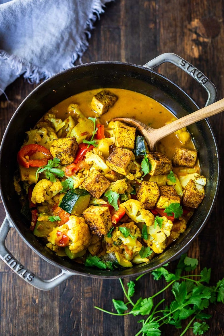 This plant-based Tikka Masala is loaded up with healthy veggies and is a simple delicious one-pot weeknight meal that can be made in under 25 minutes! Make it on the stovetop or in an Instant Pot! Vegan and Keto! Add chickpeas, tofu or paneer for extra protein. #tikkamasala #vegan #plantbased
