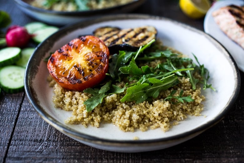 Grilled Salmon Tzatziki Bowl- a fast and delicious weeknight meal loaded up with healthy veggies! | www.feastingathome.com