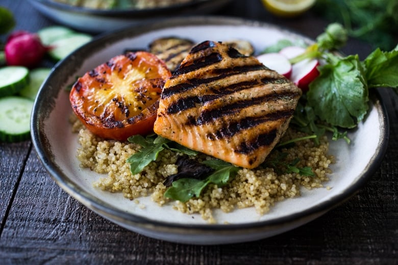 Grilled Salmon Tzatziki Bowl- a fast and delicious weeknight meal loaded up with healthy veggies! | www.feastingathome.com