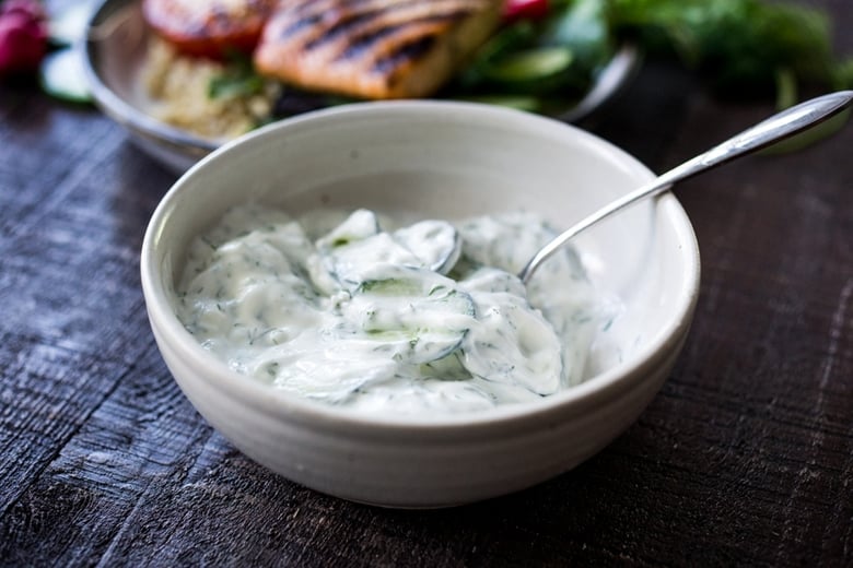 Grilled Salmon Tzatziki Bowl- a fast and delicious weeknight meal loaded up with healthy veggies! | www.feastingathome.com