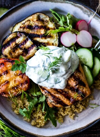 Grilled Salmon Tzatziki Bowl- a fast and delicious weeknight meal loaded up with healthy veggies! | www.feastingathome.com