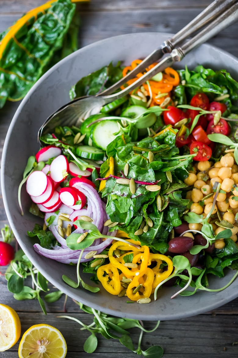 Mediterranean Chard Salad with farmers market veggies, chickpeas and toasted pepitas. | www.feastingathome.com