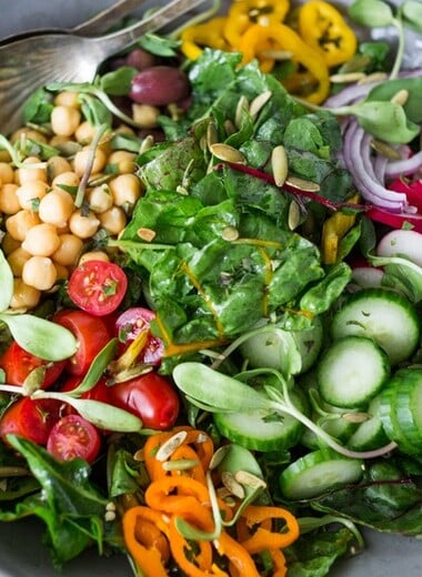 Mediterranean Chard Salad with farmers market veggies, chickpeas and toasted pepitas. | www.feastingathome.com