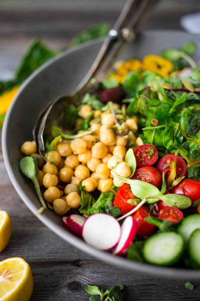 Mediterranean Chard Salad with farmers market veggies, chickpeas and toasted pepitas. | www.feastingathome.com