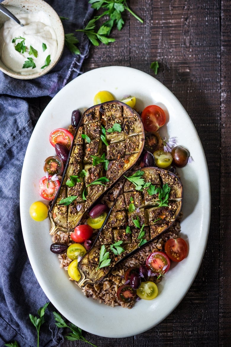 Crosshatched Zataar Roasted Eggplant served over rice or grains with lemony tahini sauce, plain yogurt or tzatzki sauce. Vegan, Gluten-free! | www.feastingathome.com 