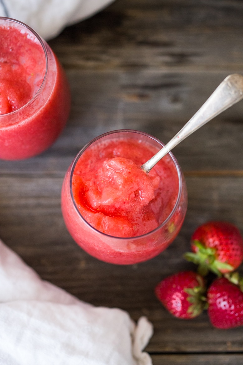 How to make a slushie! A healthy, delicious, 3-ingredient alternative to ice cream- made with fresh berries, natural sweetener,  a squeeze of citrus and ice!  Low in fat and calories, high in antioxidants. Make this in 5 minutes using your blender! So easy and refreshing. 