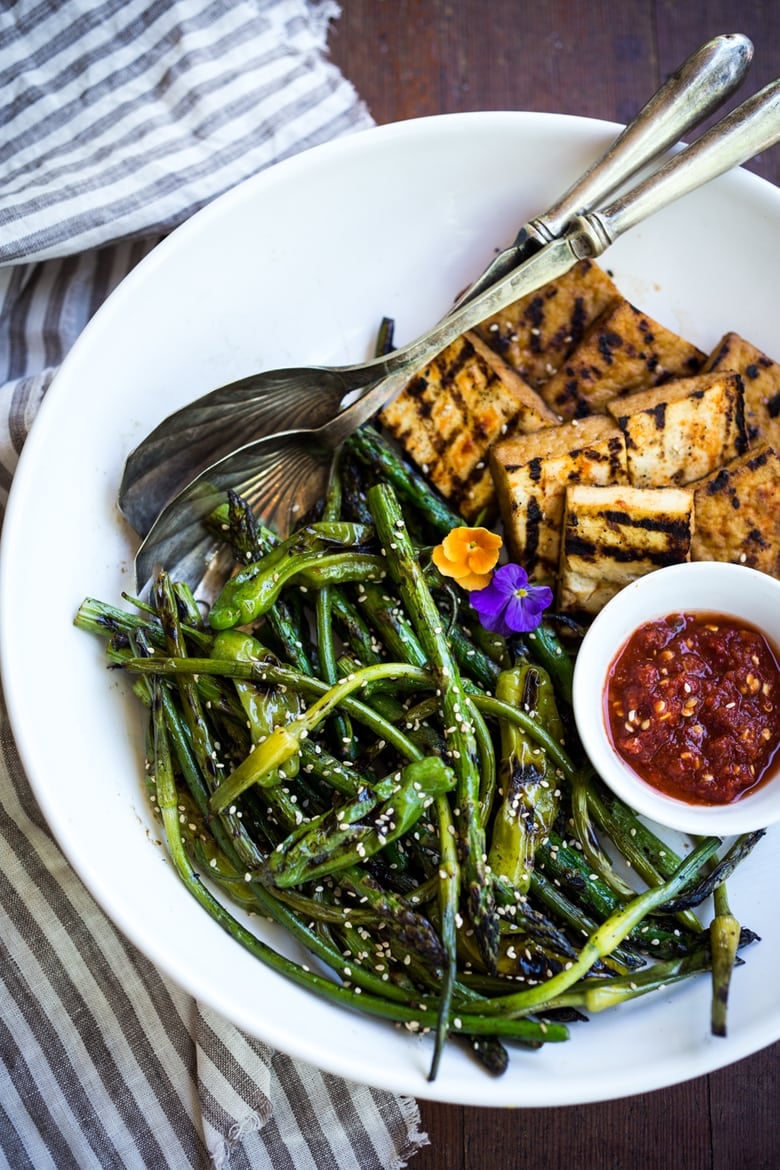 Grilled Asparagus with Garlic Scapes & Shishito Peppers tossed with a simple, Asian-Style Marinade then grilled to perfection- a vegan, gluten-free adaptable side dish, perfect for summer that can be paired with your choice of protein. 