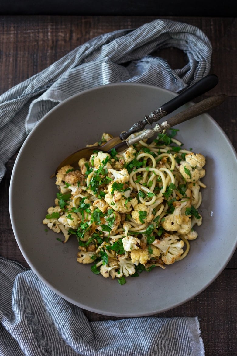 Roasted Cauliflower Pasta with Toasted Walnuts, Parsley, Garlic and Lemon Zest - a delicious vegan dinner that can be made in 30 minutes! | www.feastingathome.com