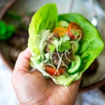 Grilled Lamb Kofta Wraps are light and delicious, and BURSTING with Middle Eastern Flavor! Served with Tzatziki, these are low carb and high in protein. | www.feastingathome.com