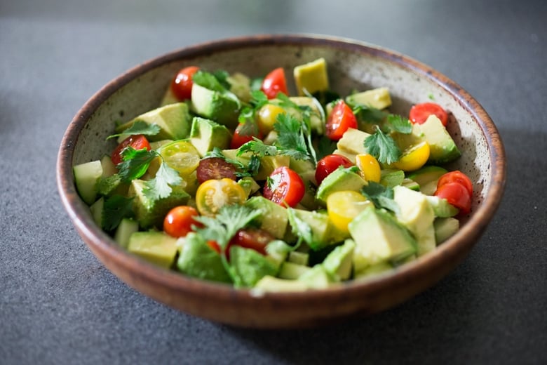 Avocado salad with tomatoes and lime.