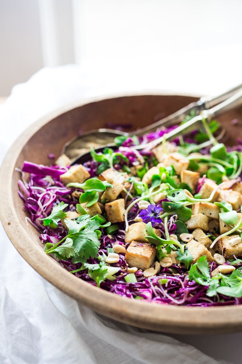 A simple,delicious and healthy recipe for Sesame Cabbage Noodle Salad with rice noodles, scallions cilantro and crunchy roasted peanuts. Vegan, Gluten-free! | www.feastingathome.com