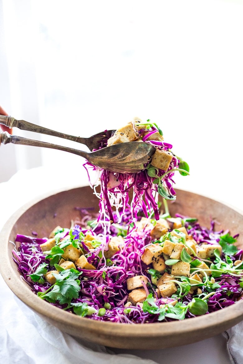 Sesame Cabbage Noodle Salad with rice noodles, crispy tofu, scallions cilantro and crunchy roasted peanuts. Vegan, Gluten-free! | www.feastingathome.com #crispytofu #noodles #noodlesalad #cabbagesalad #asiancabbagesalad #vegan