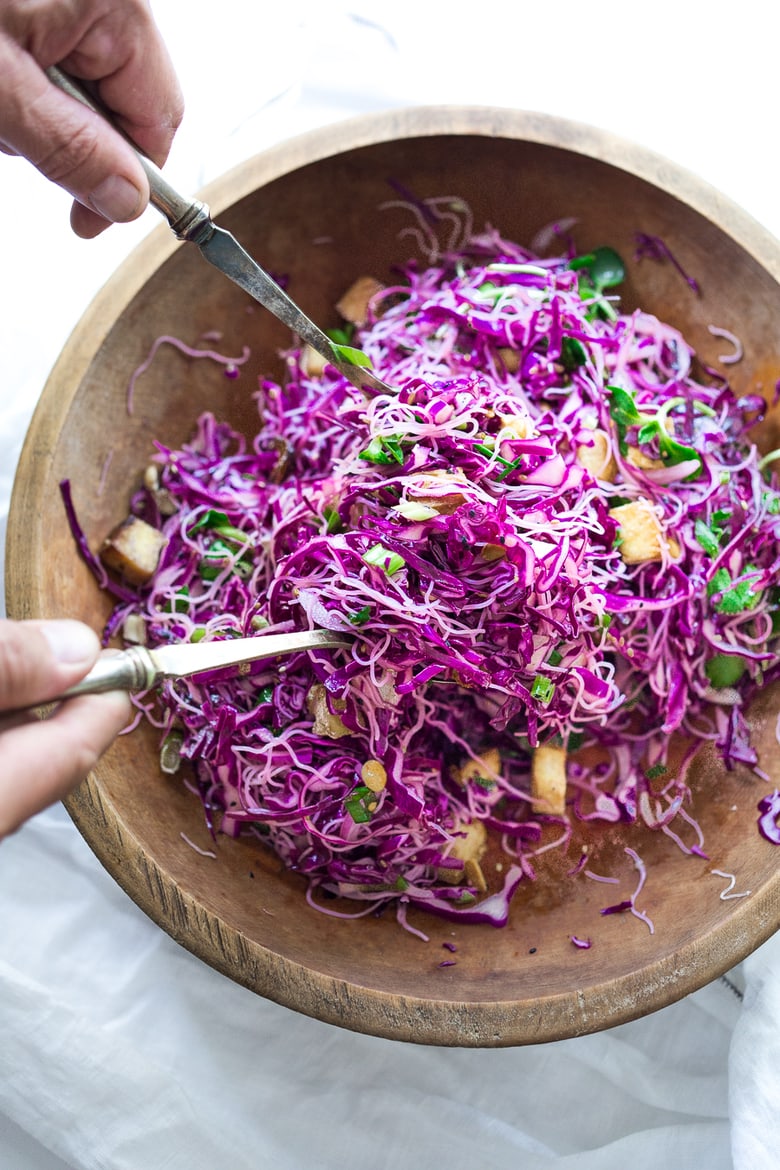 Sesame Cabbage Noodle Salad with rice noodles, crispy tofu, scallions cilantro and crunchy roasted peanuts. Vegan, Gluten-free! | www.feastingathome.com #crispytofu #noodles #noodlesalad #cabbagesalad #asiancabbagesalad #vegan