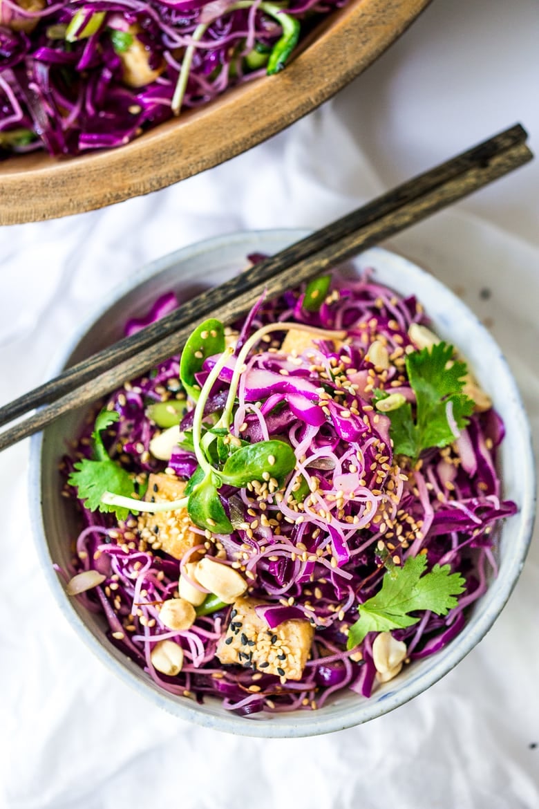 Sesame Cabbage Noodle Salad with rice noodles, crispy tofu, scallions cilantro and crunchy roasted peanuts. Vegan, Gluten-free! | www.feastingathome.com #crispytofu #noodles #noodlesalad #cabbagesalad #asiancabbagesalad #vegan