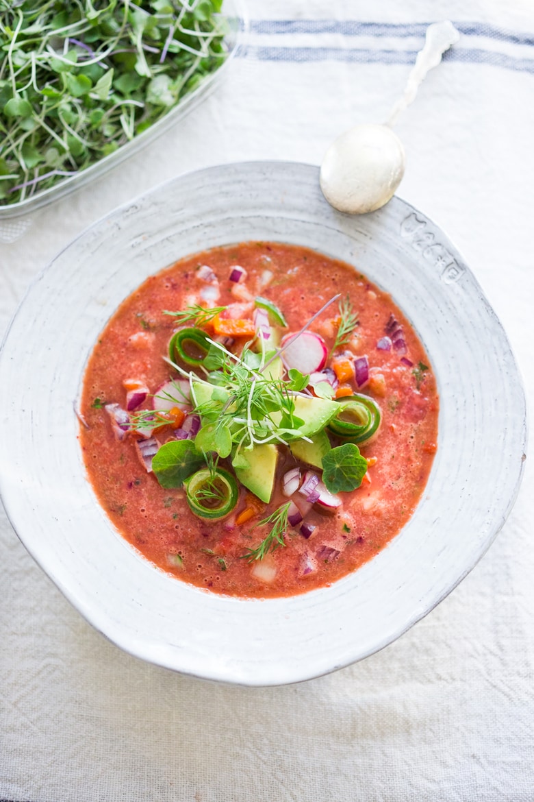 Cool and refreshing Watermelon Gazpacho with avocado, cucumber and sprouts. A easy chilled soup for summer! | www.feastingathome.com