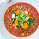 Cool and refreshing Watermelon Gazpacho with avocado, cucumber and sprouts. A easy chilled soup for summer! | www.feastingathome.com