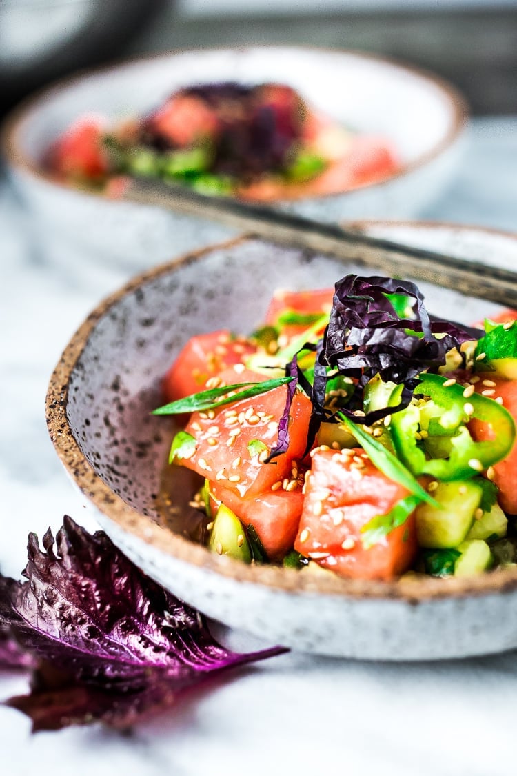 A simple delicious recipe for Watermelon Shiso Salad with Cucumber, Sesame Seeds and Scallions - a light and refreshing Asian style Watermelon Salad that is vegan, gluten-free and full of flavor! #watermelonsalad #shiso #shisorecipe #watermelon 