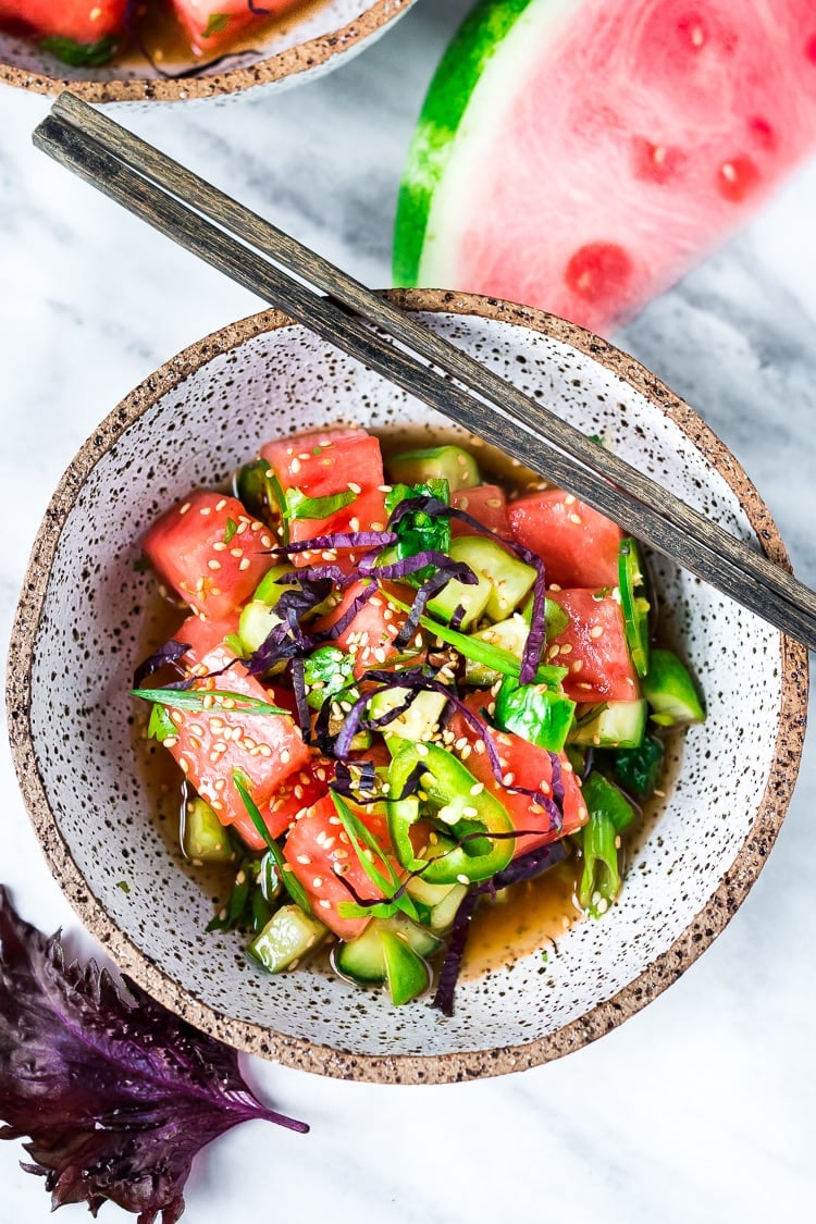 A simple delicious recipe for Watermelon Shiso Salad with Cucumber, Sesame Seeds and Scallions - a light and refreshing Asian style Watermelon Salad that is vegan, gluten-free and full of flavor! #watermelonsalad #shiso #shisorecipe #watermelon 