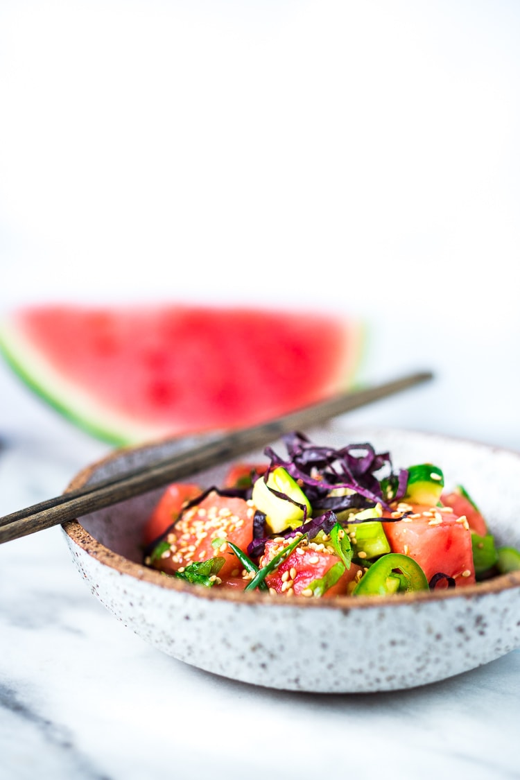 A simple delicious recipe for Watermelon Shiso Salad with Cucumber, Sesame Seeds and Scallions - a light and refreshing Asian style Watermelon Salad that is vegan, gluten-free and full of flavor! #watermelonsalad #shiso #shisorecipe #watermelon