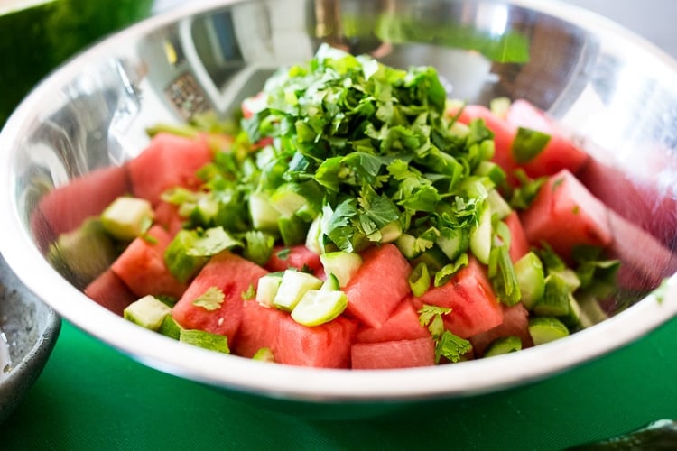 A simple delicious recipe for Watermelon Shiso Salad with Cucumber, Sesame Seeds and Scallions - a light and refreshing Asian style Watermelon Salad that is vegan, gluten-free and full of flavor! #watermelonsalad #shiso #shisorecipe #watermelon 