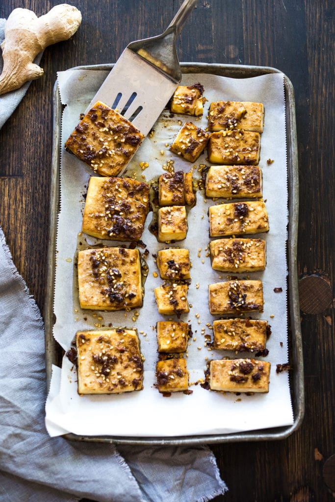 Baked tofu on a sheet pan.